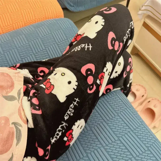 Hello Kitty pajama pants featuring a cute, all-over print of Hello Kitty characters, with soft fabric and an elastic waistband for comfort.